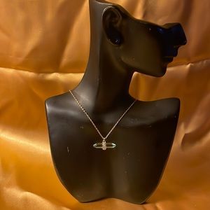 Jessica Simpson gold colored necklace w/light blue crystal w/gold & rhinestones